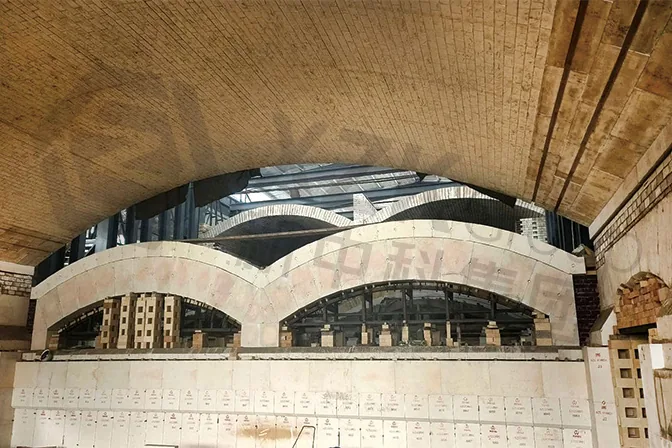 Melting end crown and port arches with the suspended hanger system above. Every crown brick here is individually supported.