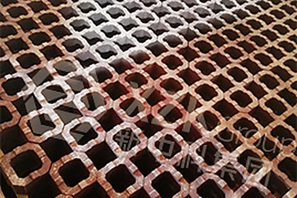 Cross-shaped checker bed. The pattern sets both the heat exchange area and the pressure drop across the chamber.