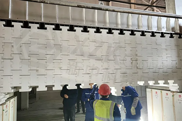 Fitting the bottom course of a suspended wall.